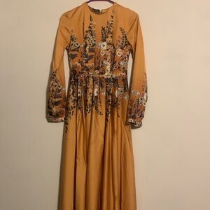 Long sleeved dress an Anna Ariri brand dress for sale beautiful pattern